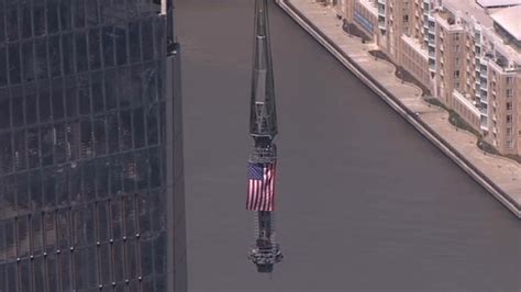 World Trade Center Rising Flag Covered Spire Lifted To Roof Nbc New York