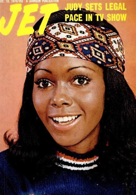 An Old Magazine Cover With A Woman Wearing A Head Wrap On The Front And Side