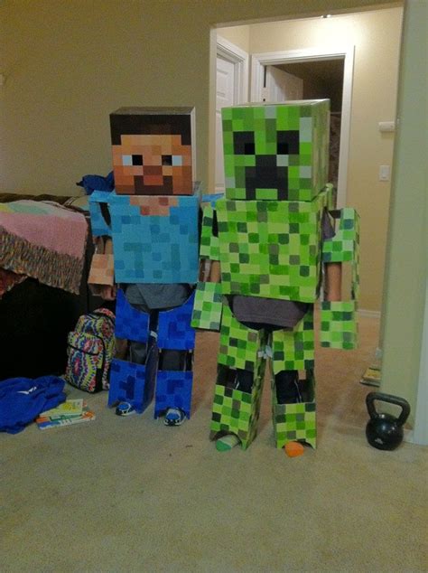 Three People In Costumes Made To Look Like Minecrafts