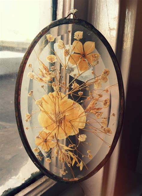 Let this glass vase be the star of the table. Vintage Pressed Flowers Glass Window Decor by vintagelamodern