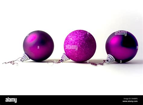 Three Purple Christmas Baubles Stock Photo Alamy