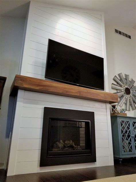 Taking that shiplap further up the wall felt like the right scale for a room with this height. Design suggestions for fireplace mental in 2020 | Diy ...