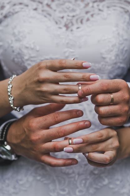 Premium Photo Hands Of Newlyweds With Wedding Rings