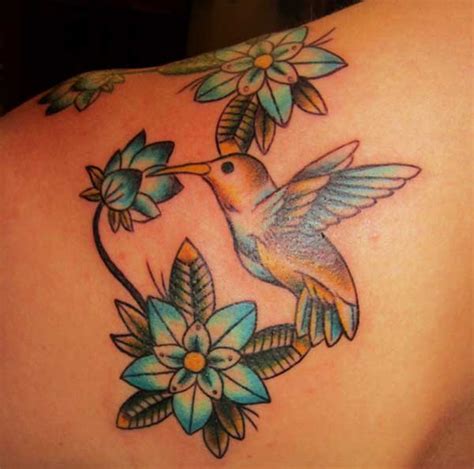 Blue hummingbird tattoo with flowers on the chest of man. Best 24 Hummingbird Tattoos Design Idea For Women ...