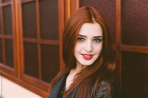 Portrait Of Happy Girl With Red Hair By Stocksy Contributor Alexey Kuzma Stocksy