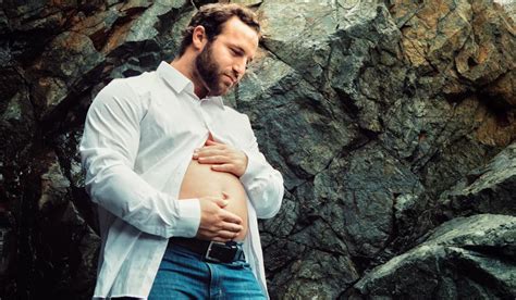 Man Poses In Hilarious Maternity Shoot With A Fast Food Baby Belly