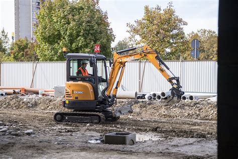 The house sits atop an undercarriage with tracks or wheels. Case CX26C Mini Excavator - Dennis Barnfield Ltd - Est.1964