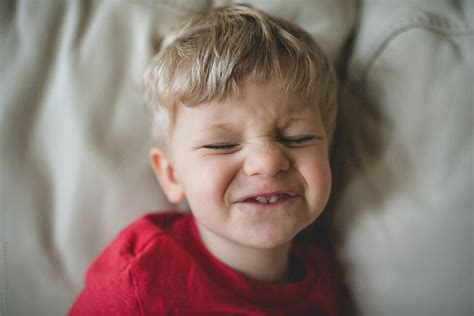 Boy Making Funny Face By Stocksy Contributor Courtney Rust Stocksy