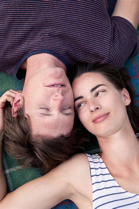 Young Couple Lying On Picnic Blanket License Image 71084558 Lookphotos