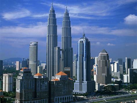 Petronas Twin Towers In Kuala Lumpur Malaysia Beautiful Traveling Places