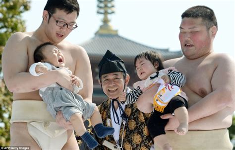 Sumo Wrestlers Try To Make Babies Cry In Bizarre Contest During Nakizumo Festival Daily Mail