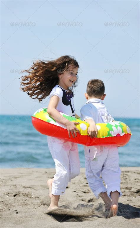 Happy Young People Group Have Fun On Beach By Dotshock Happy Young