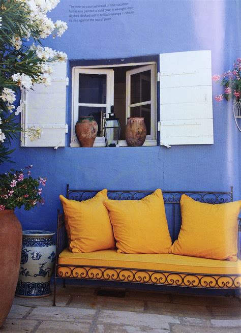 Tuscan Style Magazine Article Royal Blue Wall Orange Yellow Couch