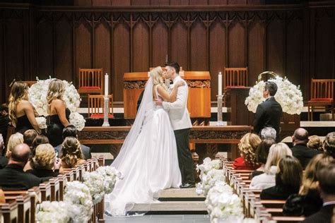 Bride And Groom Kiss At Church Ceremony