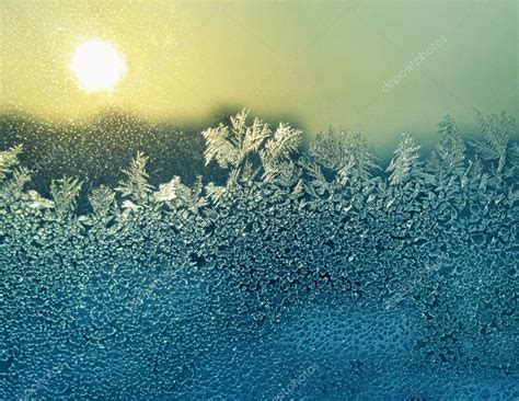 Ice Patterns And Sun On Winter Glass — Stock Photo © Dink101 10262805
