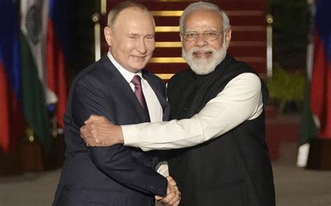File Russian President Vladimir Putin Left And Indian Prime Minister Narendra Modi Greet