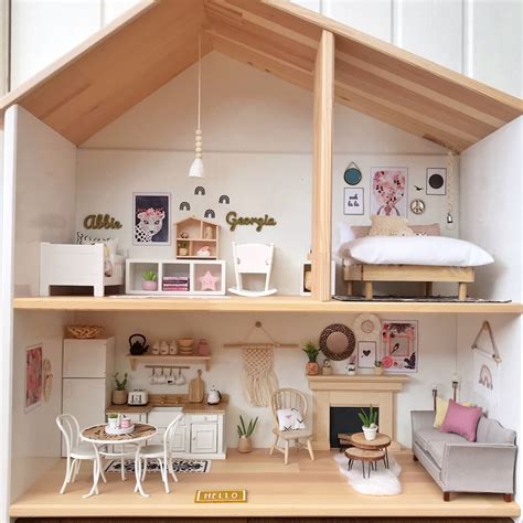 this ikea flisat dolls house shelf has been customised by us to include open plan and white wall