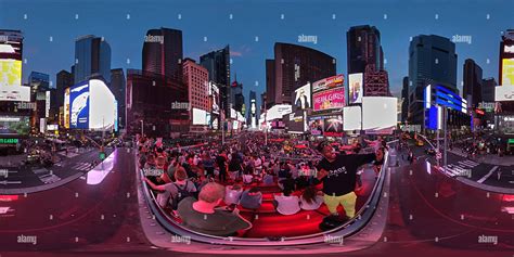 360° View Of 360 Panorama Of Times Square New York At Dusk With Tourist