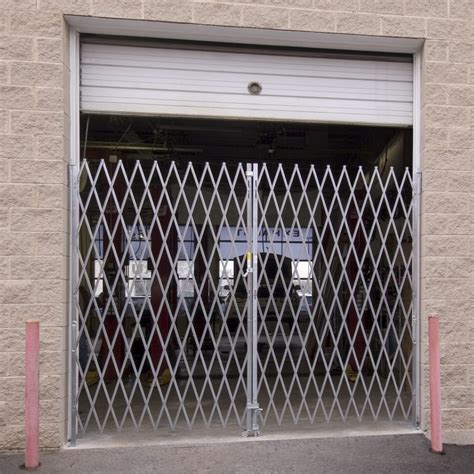 Heavy Duty Pair Folding Security Gates Barron Equipment Overhead Doors