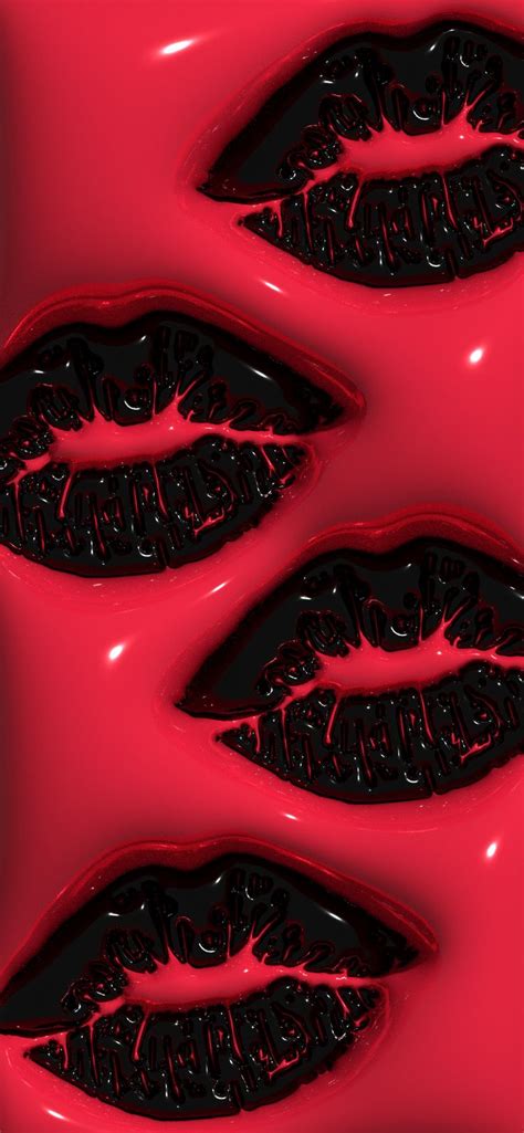 Three Black Lips Are Floating In Red Liquid
