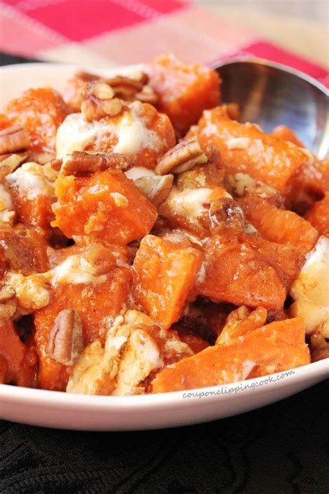 Fresh sweet potatoes dripping in a sweet cinnamon sauce covered in marshmallow is the best · candied yams are a huge part of southern cuisine. Candied Yams with Pecans and Marshmallows | Recipe (With ...