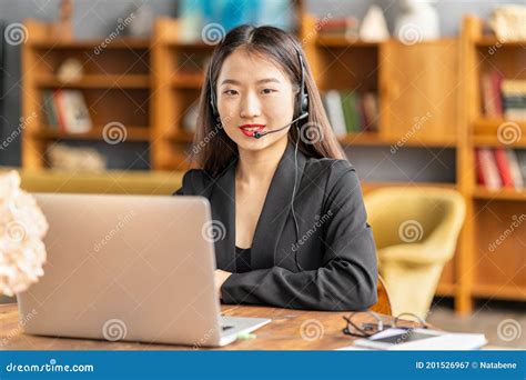 Smiling Chinese Support Service Agent Consulting Customer Female