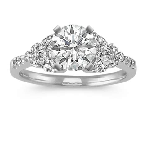 Custom antqiue vintage inspired marquise diamond engagement ring with your choice of carat size and metal. Marquise and Round Diamond Engagement Ring | Shane Co.