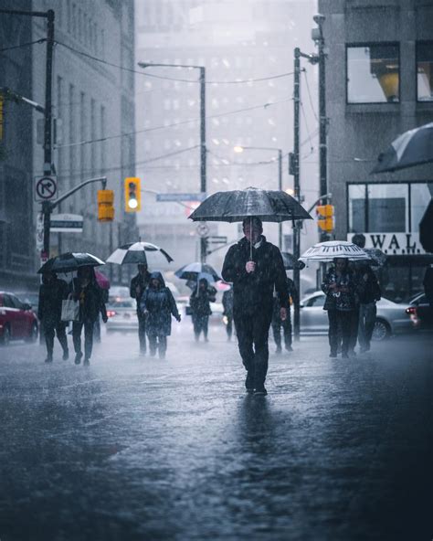Itap Of People Walking In The Rain Walking In The Rain City Streets