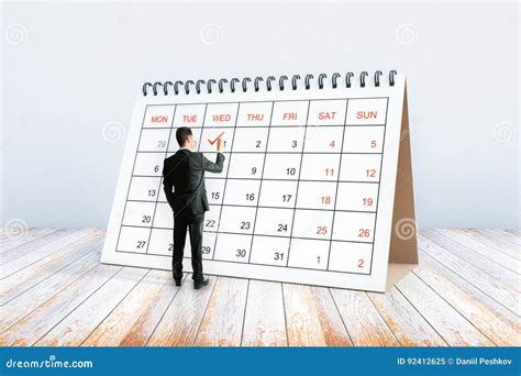 Man Writing In Calendar Stock Image Image Of April Business 92412625