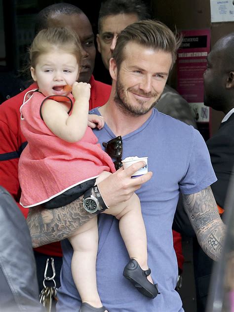 David Beckham Held On To His Daughter Harper Beckham In Paris On