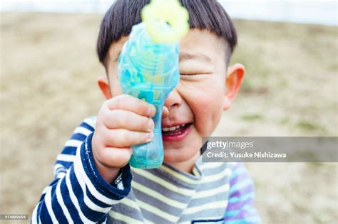 Portrait Of Little Boy Pulling Funny Faces High Res Stock Photo Getty