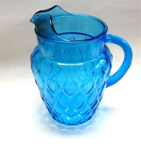 Anchor Hocking Turquoise Blue Glass Pitcher Flame Honeycomb Etsy Blue Glass Pitcher Blue