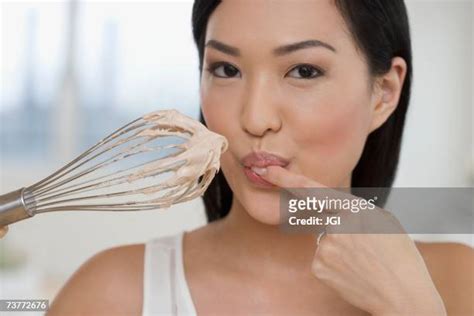 Asian Woman Licking Finger Photos And Premium High Res Pictures Getty Images