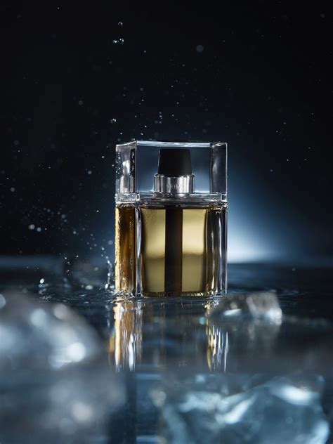 Fragrance Photography Perfume Bottle On Table With Ice Cubes