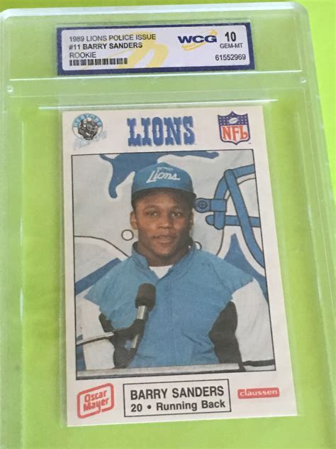 The front of the card depicts an image of the detroit lions running back, and the back has some information about sanders. Lot Detail - BARRY SANDERS 1989 ROOKIE "10" in $15 SLAB