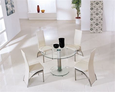 Round glass top dining room sets in rattan or powder coated metal are a great way to upgrade a breakfast. 18 Sleek Glass Dining Tables