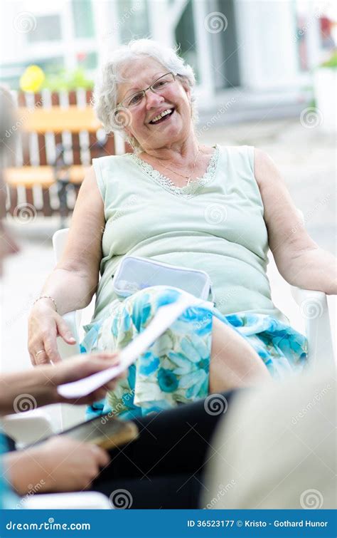 Senior Woman Relaxing Stock Image Image Of Hedge Happiness