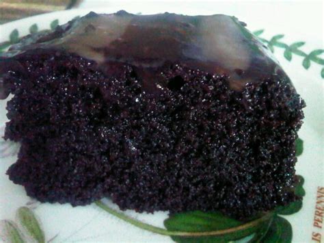 This chocolate cake recipe is super easy to put together, moist and delicious! Moist Chocolate Cake - Azie Kitchen