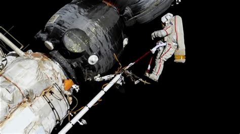 russian cosmonauts take spacewalk to probe mystery of craft hole