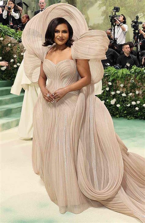 Mindy Kaling S Enormous Train At The 2024 Met Gala Requires Multiple