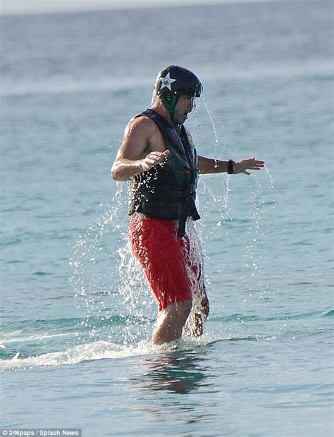 + body measurements & other facts. Alan Shearer hits the beach shirtless for a day of ...