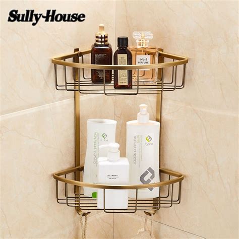 Storage shelves for bathroom organization. Sully House Antique Brass bathroom corner basket shelf ...