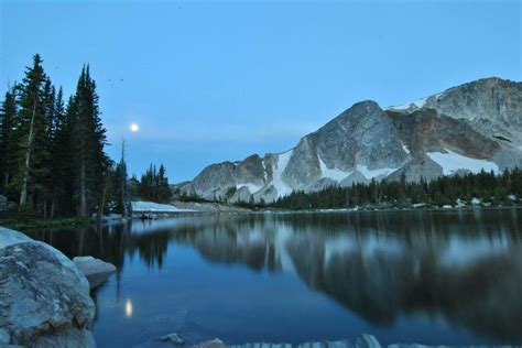 The Thunder Moon Setting On Mirror Lake At Medicine Bow Peak Before