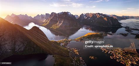 Midnight Sun Over Reine Lofoten Norway High Res Stock Photo Getty Images