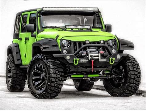 LIME GREEN JEEP MODIFIED WITH MANY EXTRAS INCLUDING MY FAVORITE TIRES