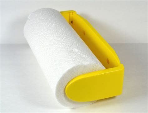 This Bright Yellow Folding Plastic Paper Towel Holder Was