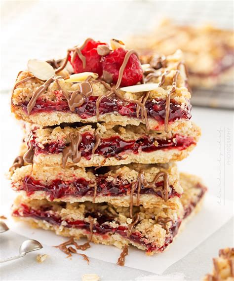 They begin with a buttery shortbread crust. Skinny Raspberry Shortbread Bars - The Chunky Chef