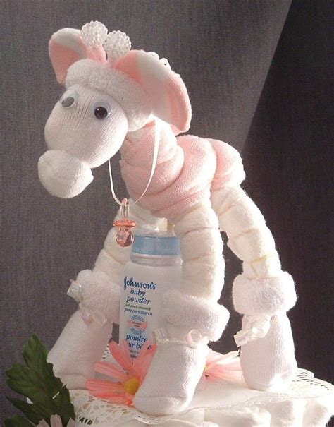 Donut themed baby sprinkle shower (and free you can easily make your own diaper cake for the next baby shower you host or attend. ink GIRAFFE Diaper Cake TOPPER Girl Baby Shower ...