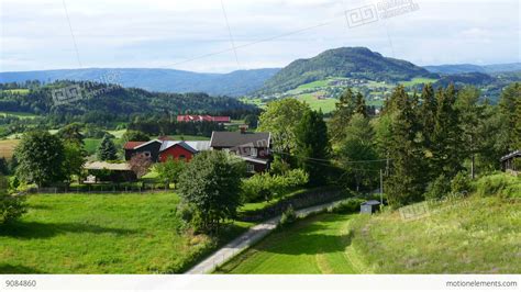 Norwegian Countryside Village Landscape With Green Farm View Stock