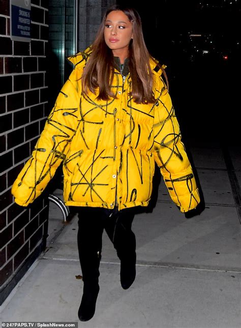 Ariana Grande Bundles Up In Big Yellow Puffer Jacket As She Heads To